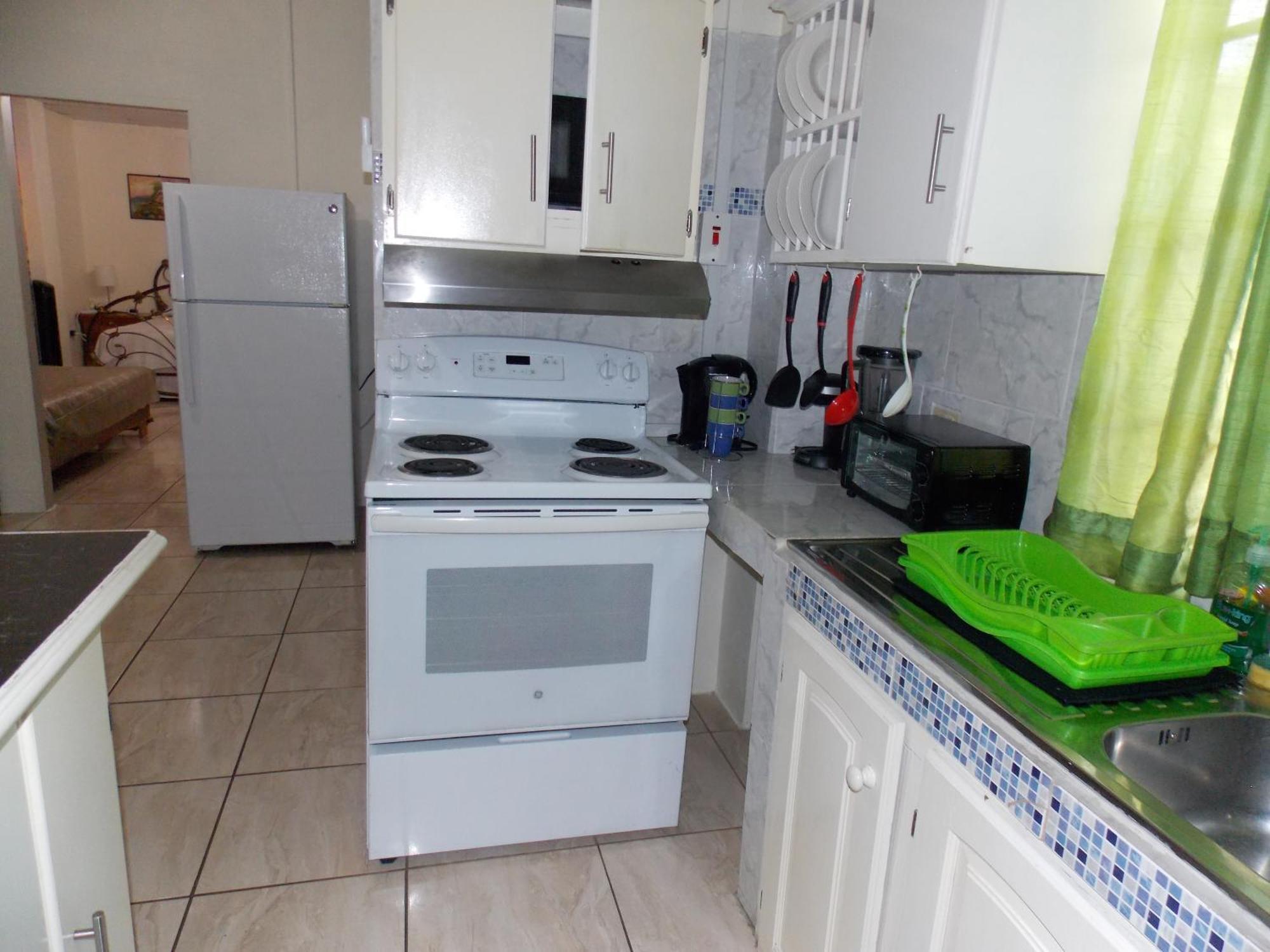 Stewart Apt- Trincity, Airport, Washer, Dryer, Office, Cable , Wifi Room photo